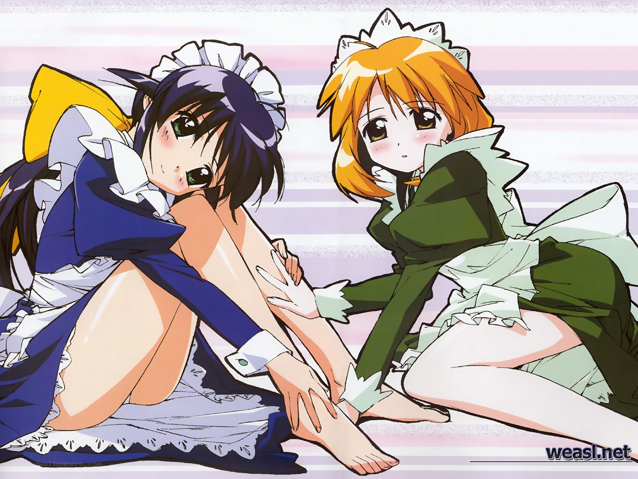 two maids in colorful uniforms