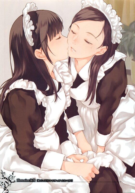 Two maids sharing a kiss
