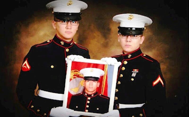 Two Marines Holding Photo