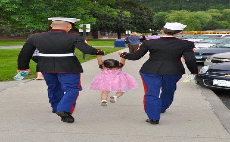 Two Marines with Child