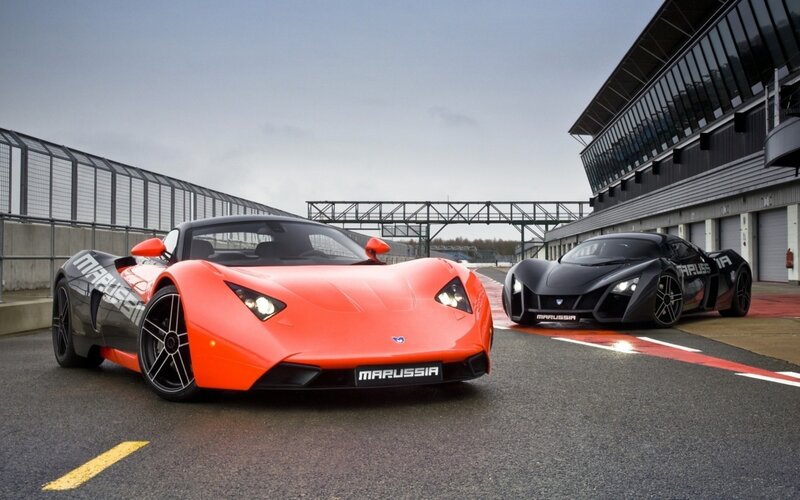 Two Marussia Sports Cars — Orange, Dramatic, Afternoon