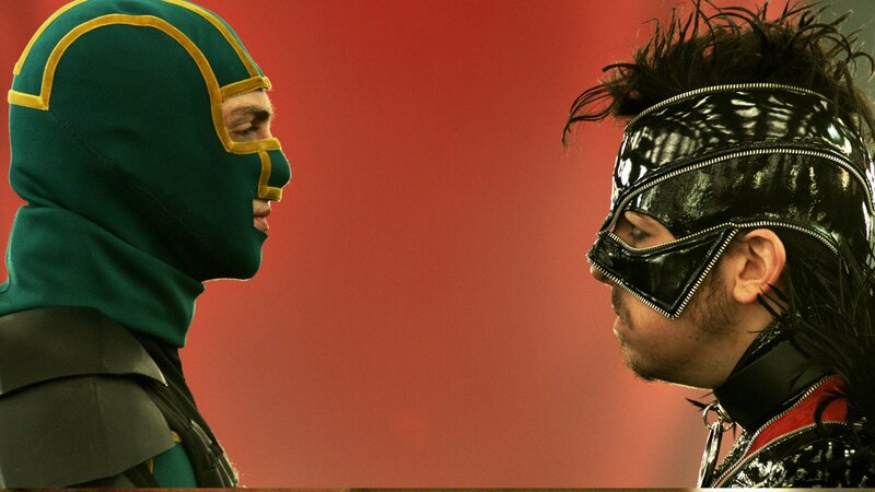 two masked figures facing off