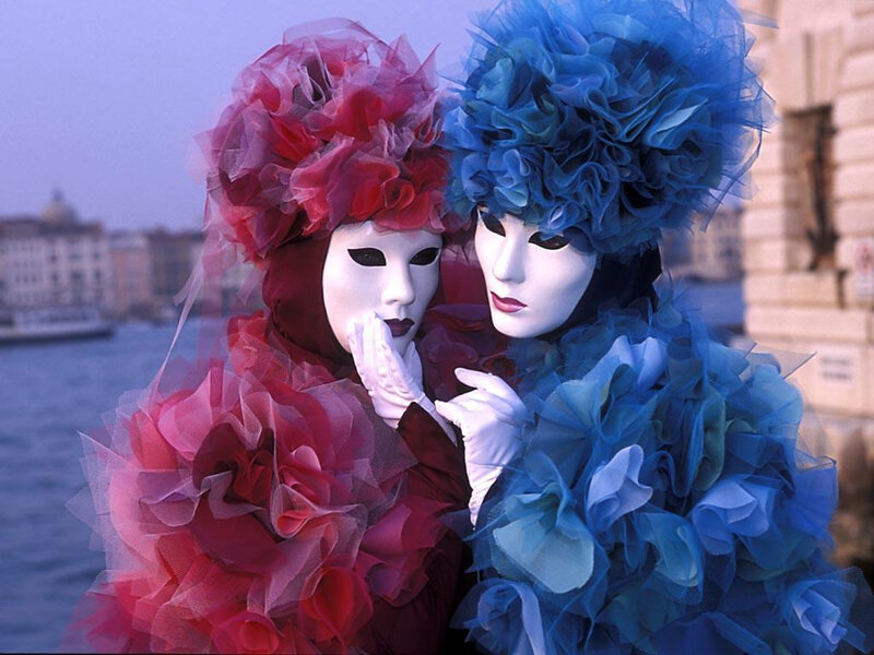 Two Masked Figures — Red, Dramatic, Sunset, Photograph