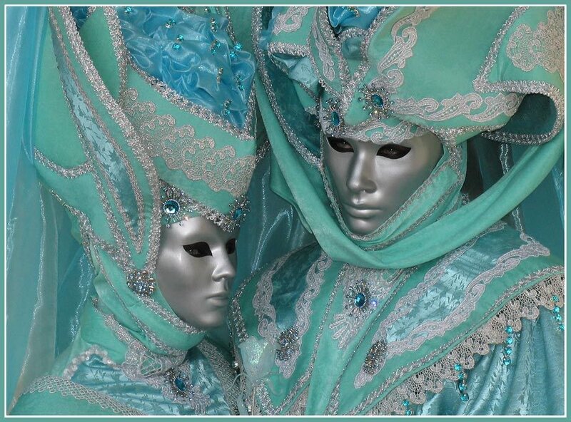 Two Masked Figures