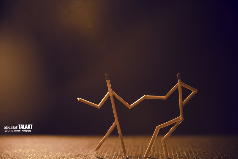 Two Matchstick Figures — Brown
