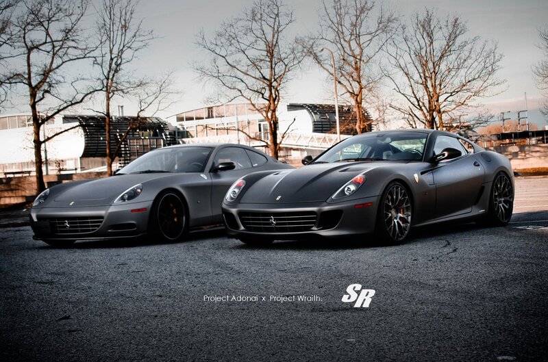 Two matte gray Ferraris parked