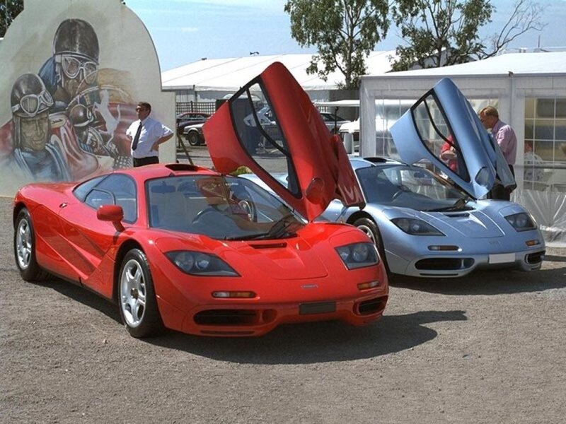 Two McLaren F1 cars on display