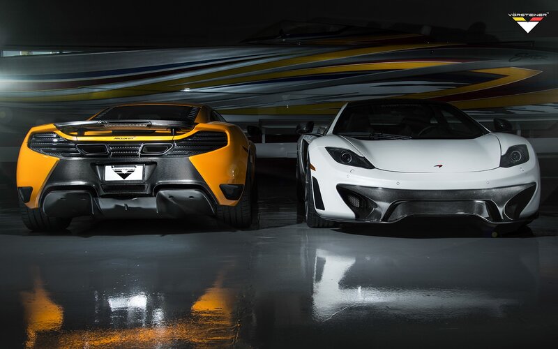 Two McLaren Sports Cars — White, Dramatic