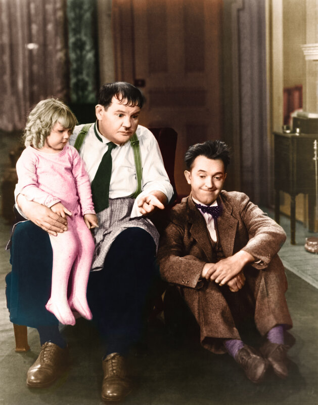 Two men and a child in vintage photo
