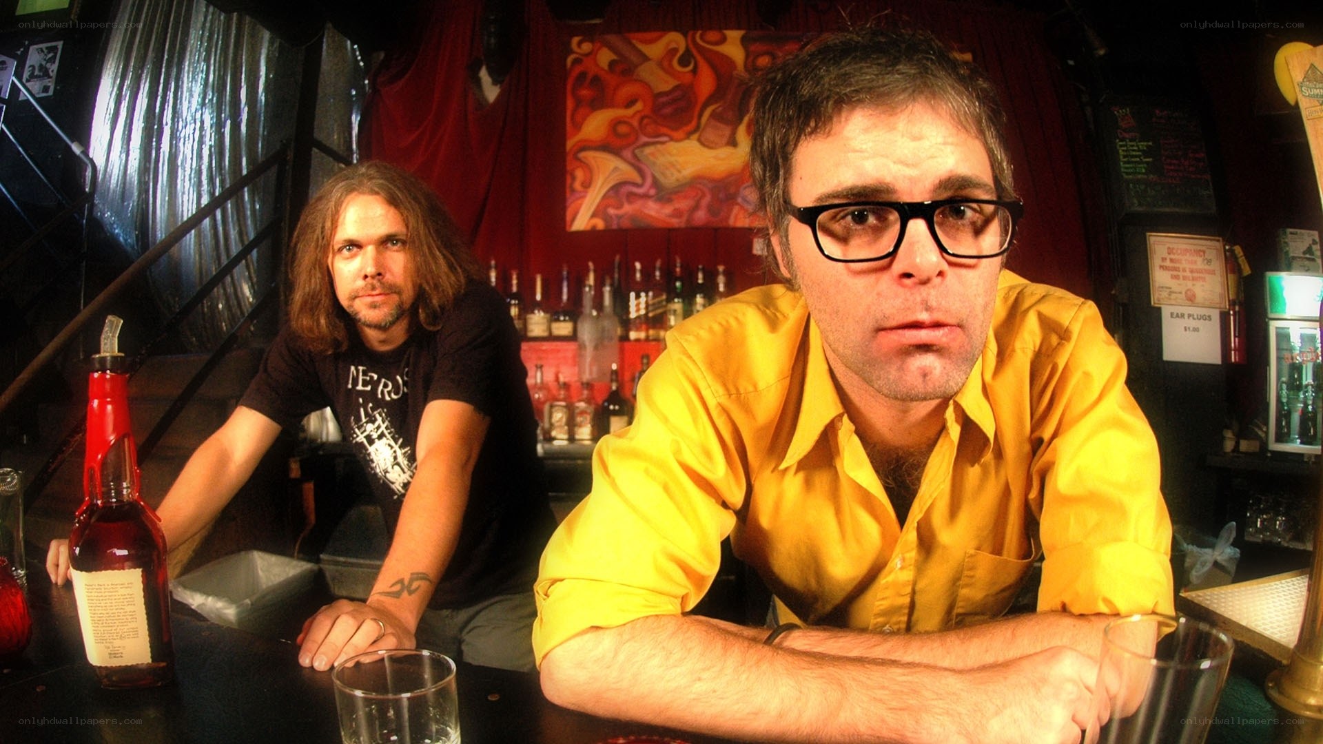 Two men at a bar
