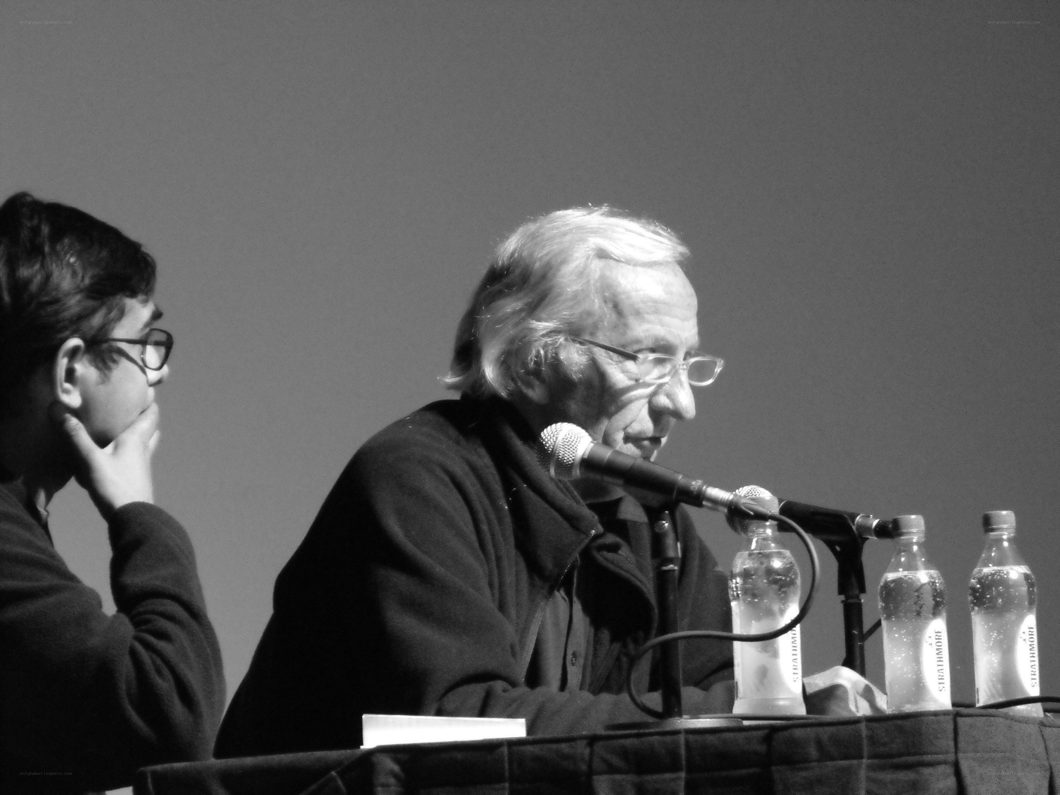 Two men at a panel discussion