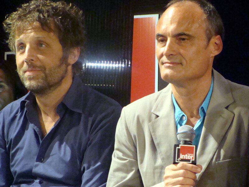 Two men at a press event