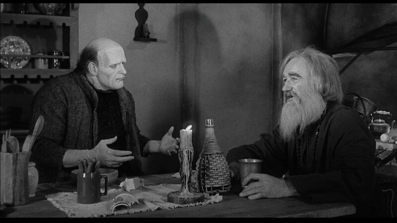 Two Men at a Table — Black