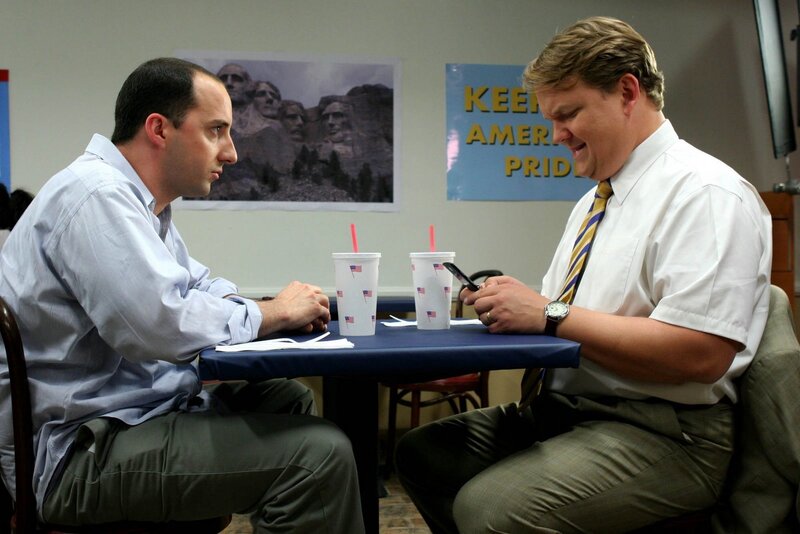 Two men at a table with drinks