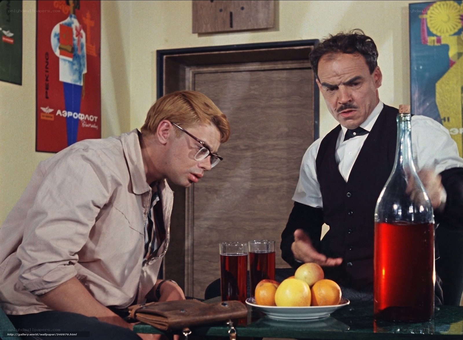 Two men at a table with drinks