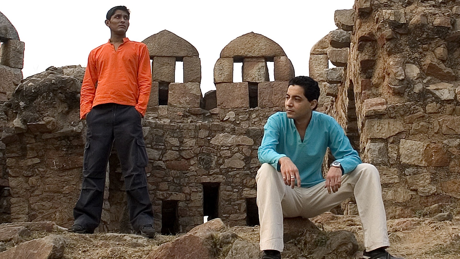 Two men at ancient ruins