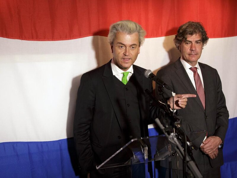 Two Men at Podium
