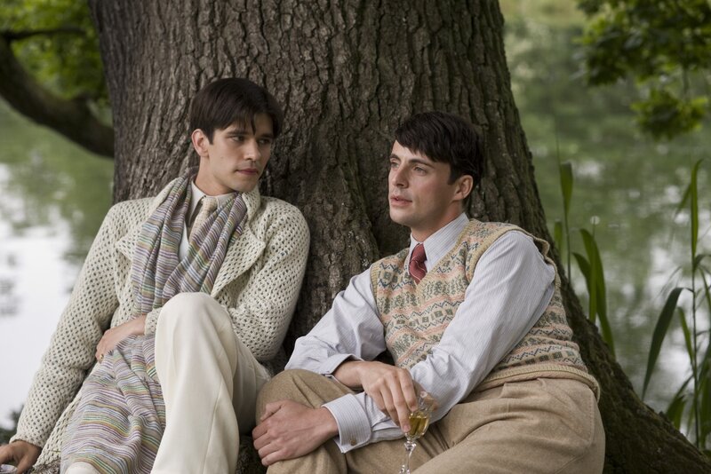 Two men by a tree