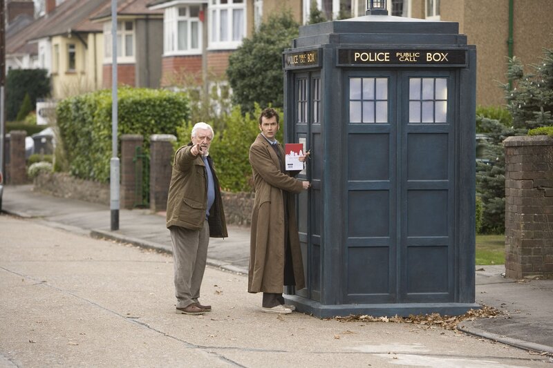 Two Men by Phone Booth