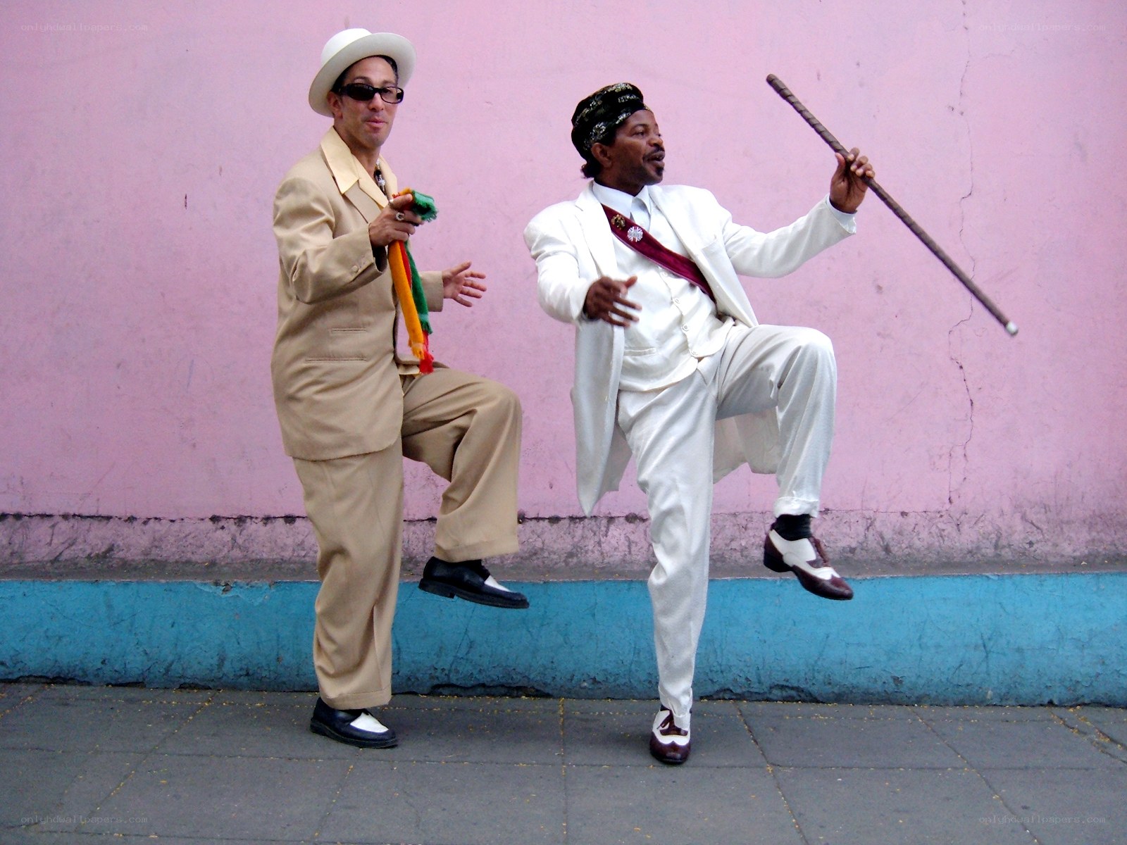 Two men dancing in suits