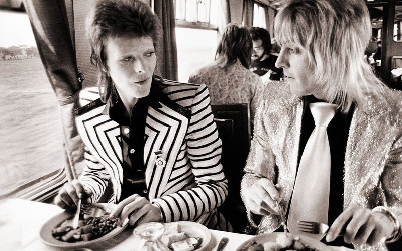 Two Men Eating Dinner