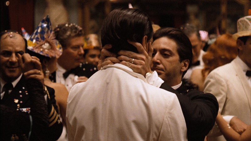 Two Men Embracing — White, Dramatic