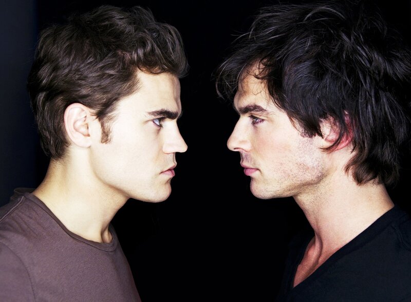 Two Men Facing Each Other — Black, Dramatic, Photograph, Profile View, Dark Background