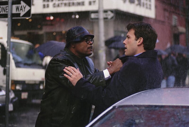Two Men Fighting in Rain