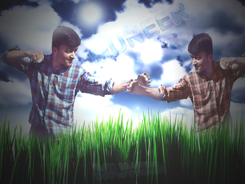 Two men fist bumping
