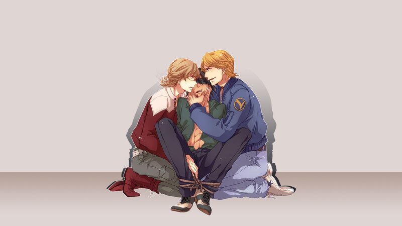 Two men holding a third