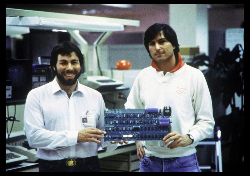 Two Men Holding Circuit Board — White, Neutral