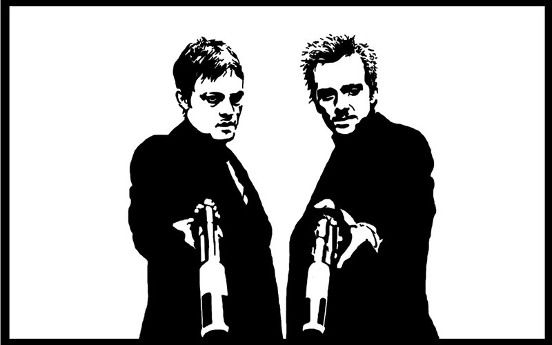 Two Men Holding Guns — Dramatic