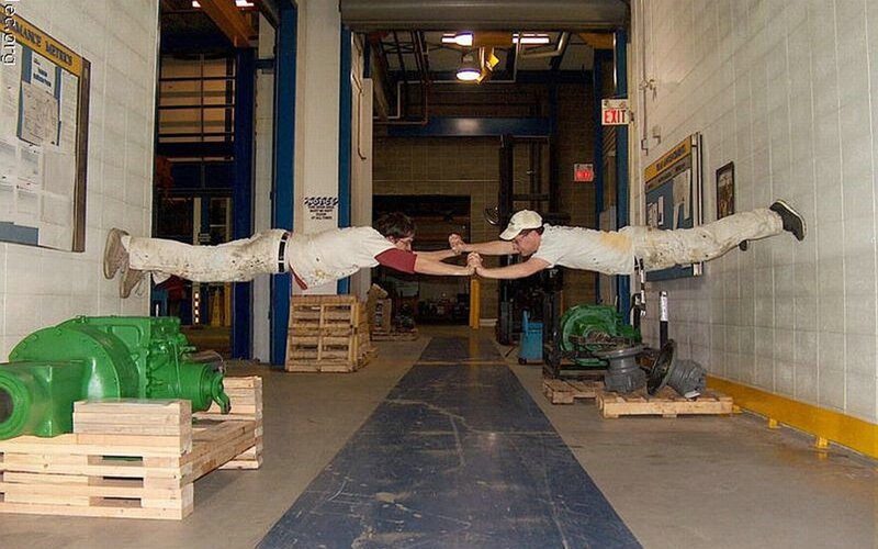 Two Men Holding Hands — White