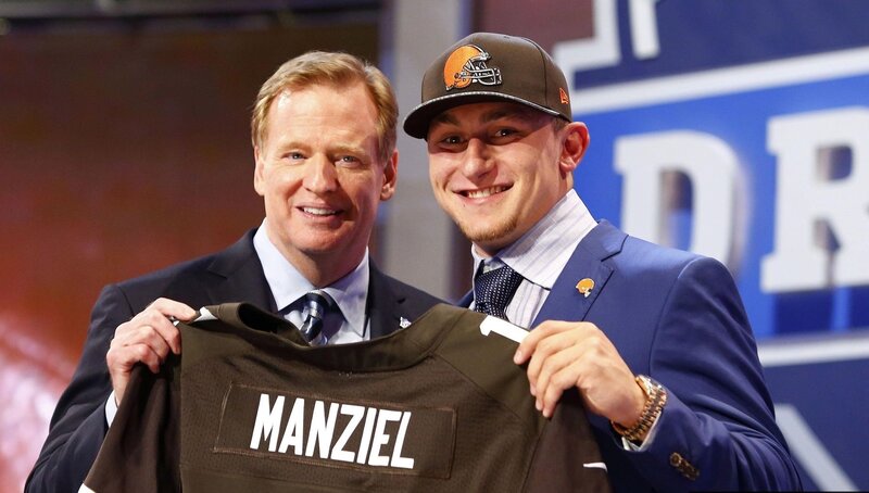 Two Men Holding Jersey