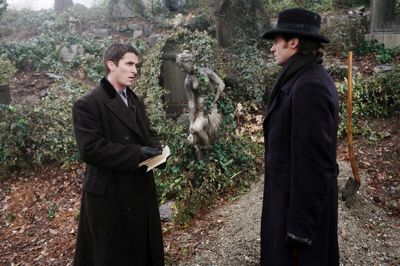 Two men in a cemetery