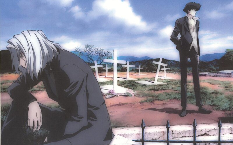 Two men in a cemetery