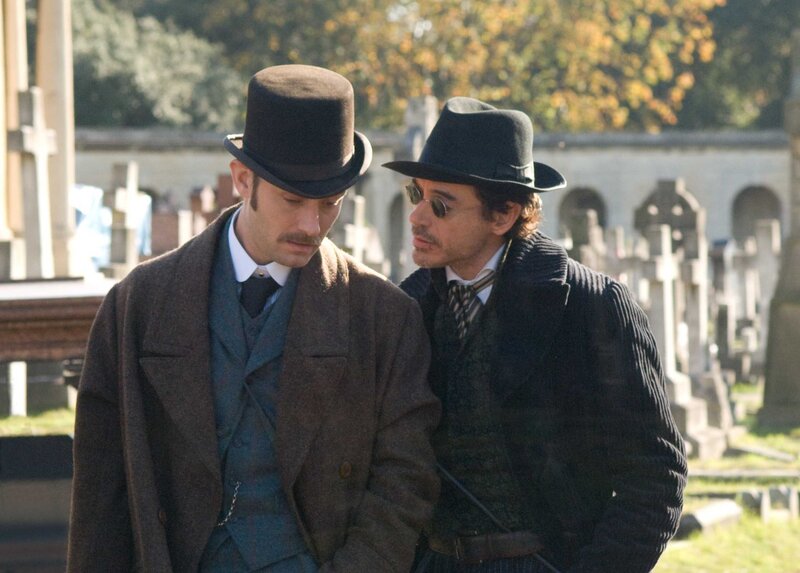 Two men in a cemetery