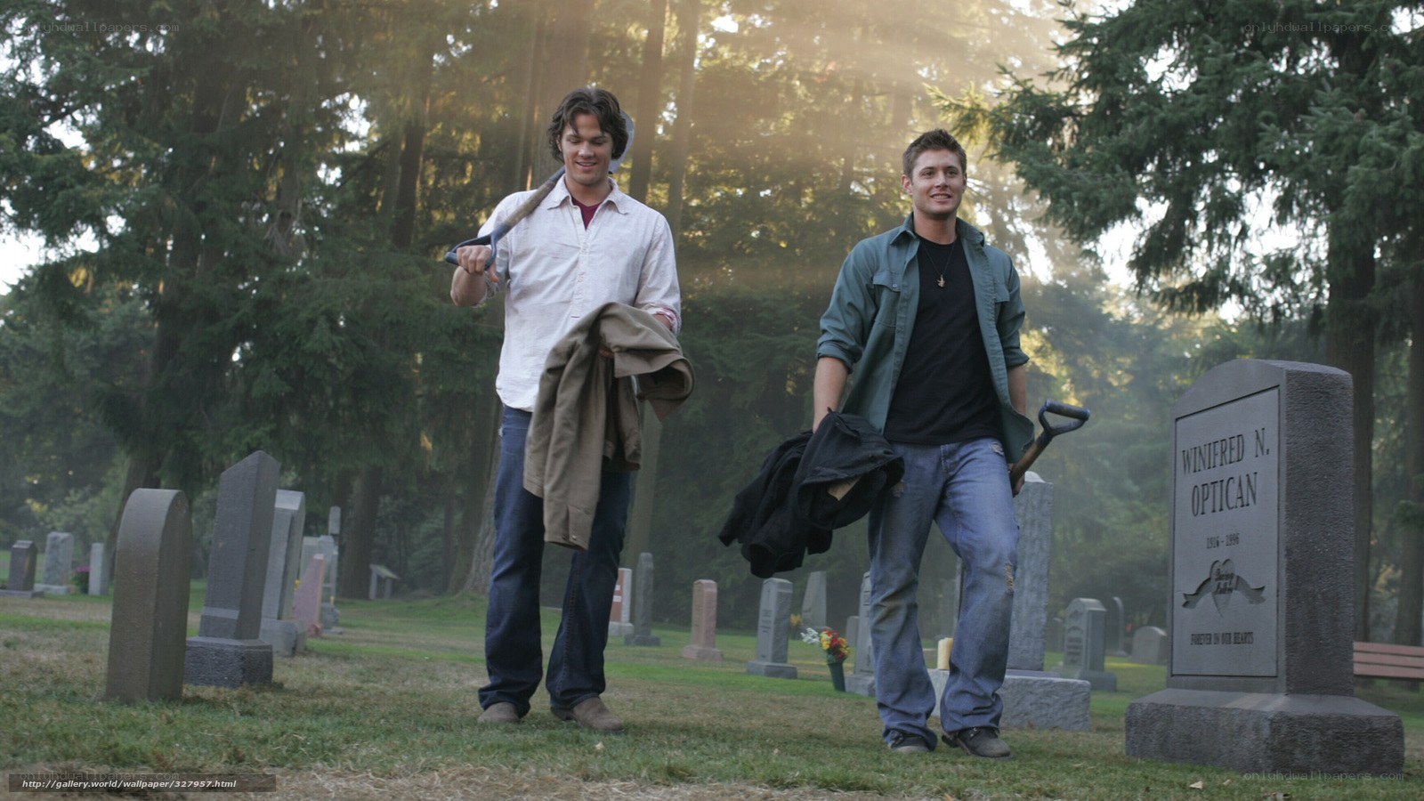 Two men in a cemetery