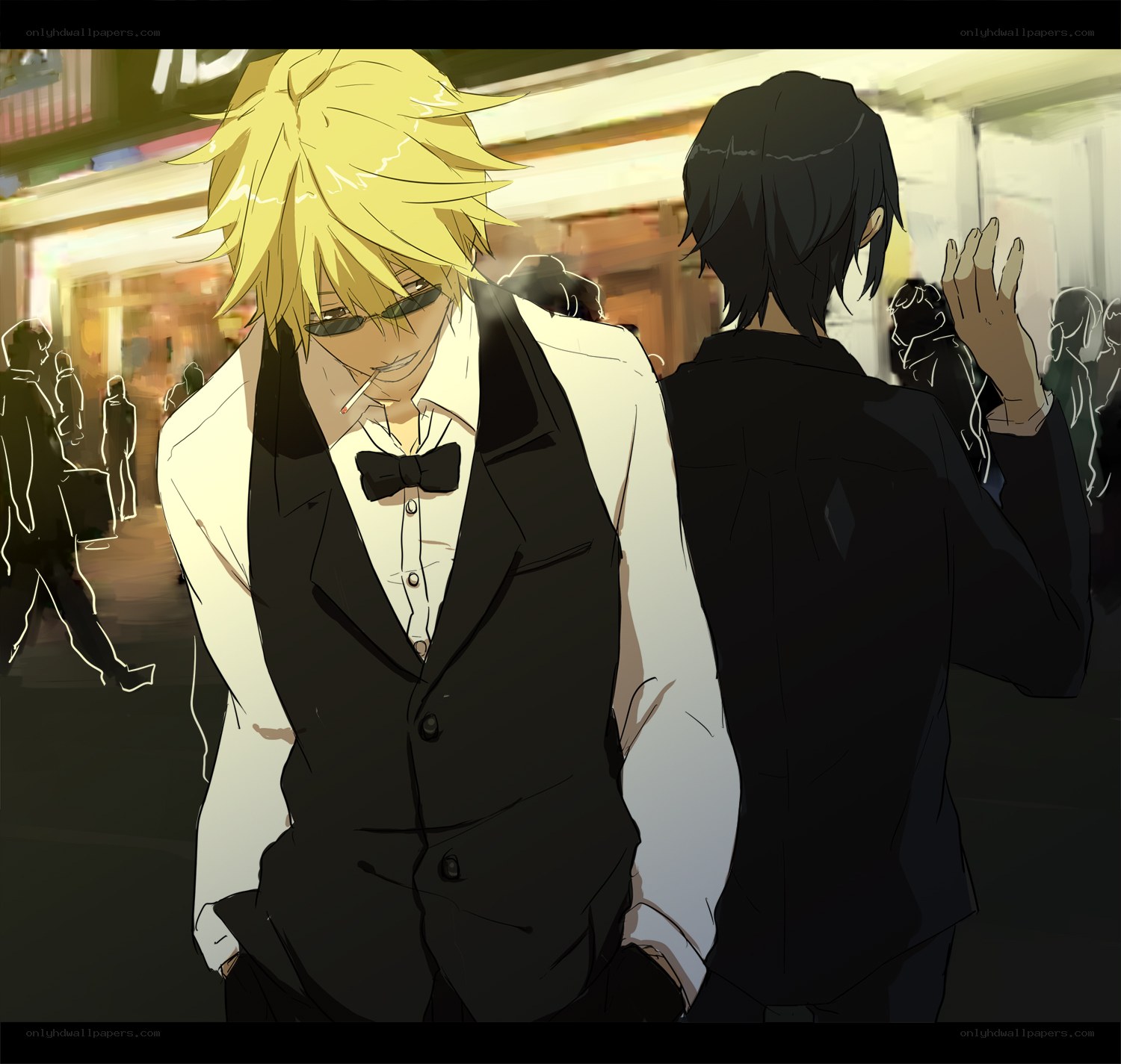 Two men in a city at night