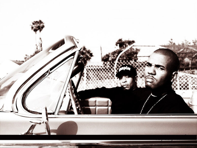 Two men in a classic convertible