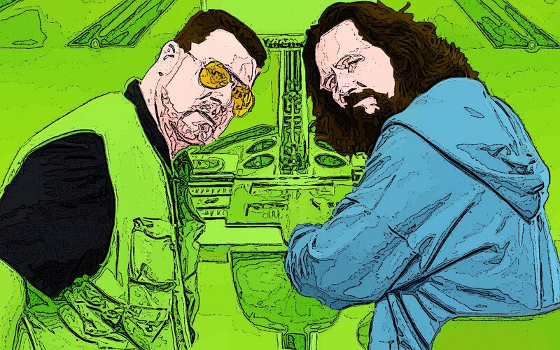 two men in a cockpit