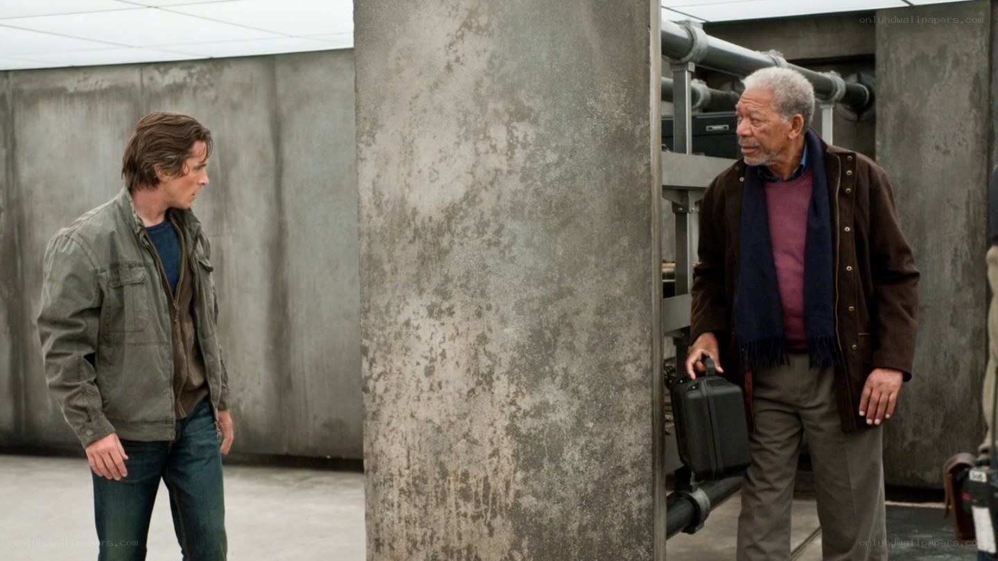two men in a concrete room