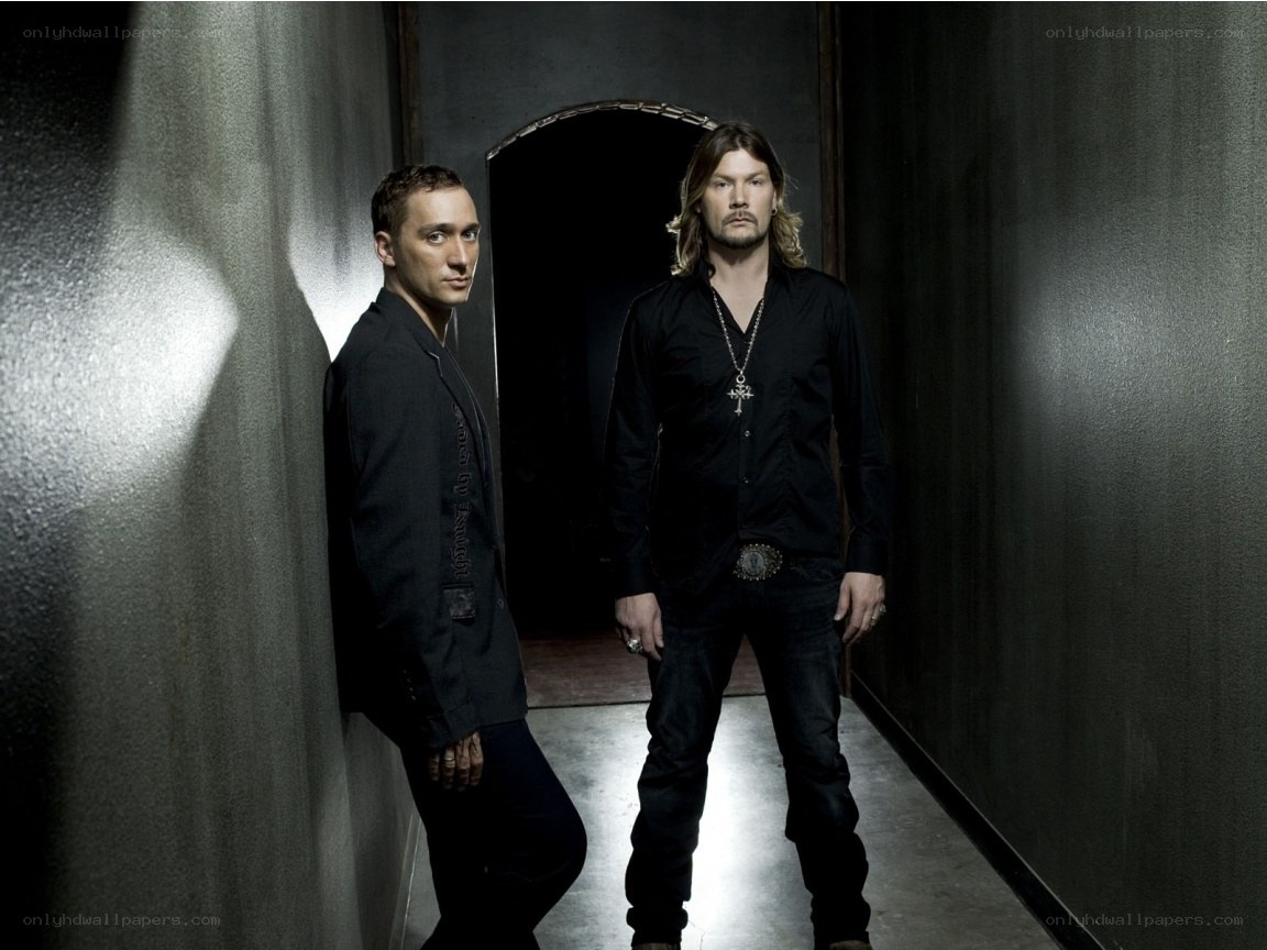 two men in a dark hallway