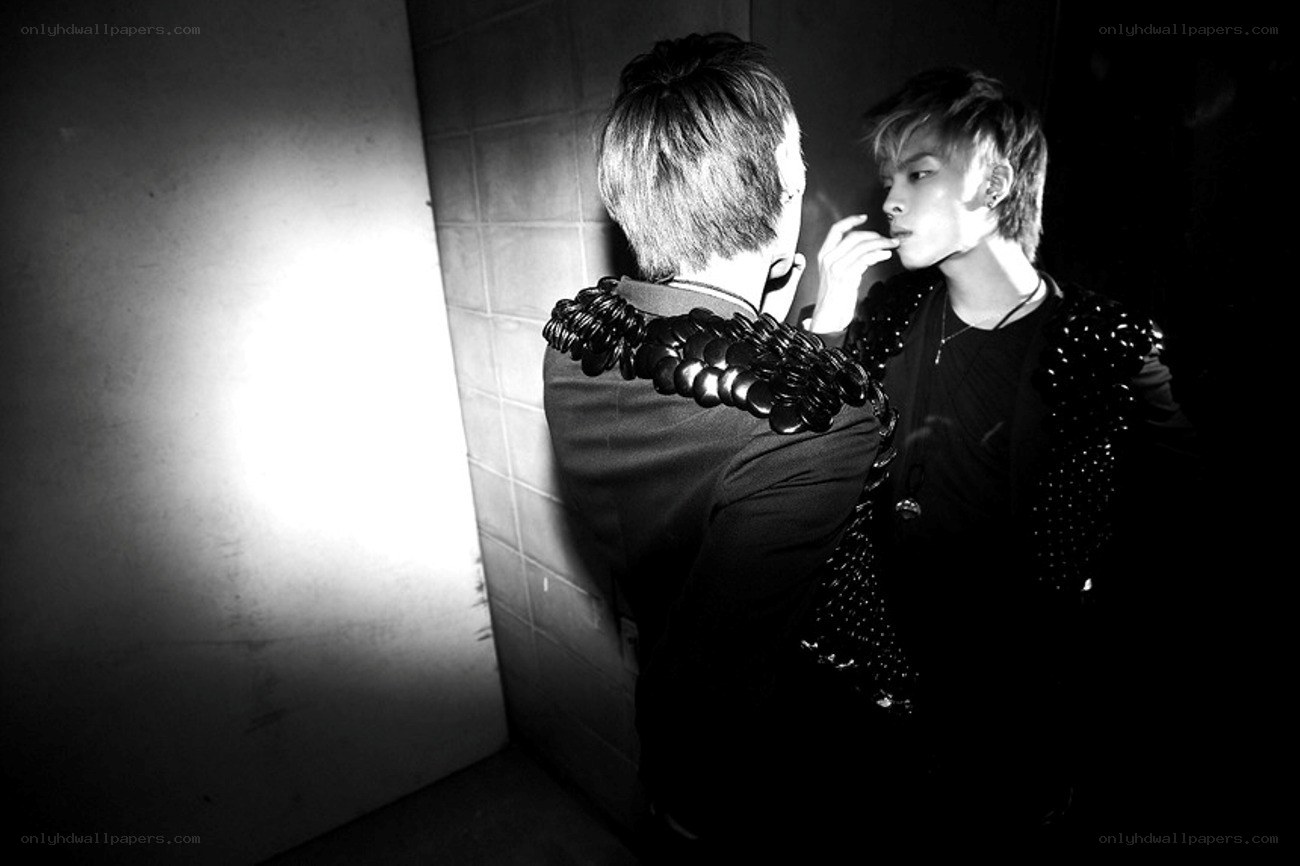 two men in a dark hallway