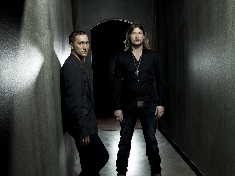 two men in a dark hallway