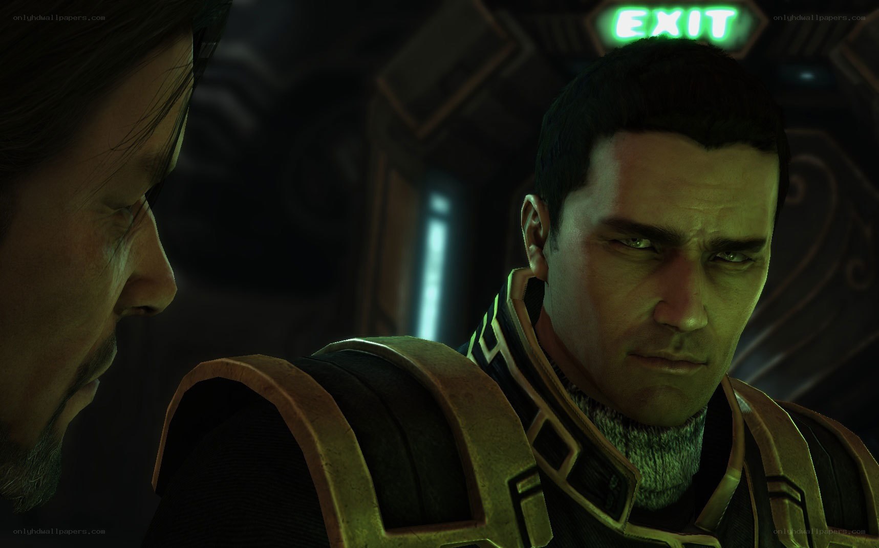 two men in a dimly lit corridor