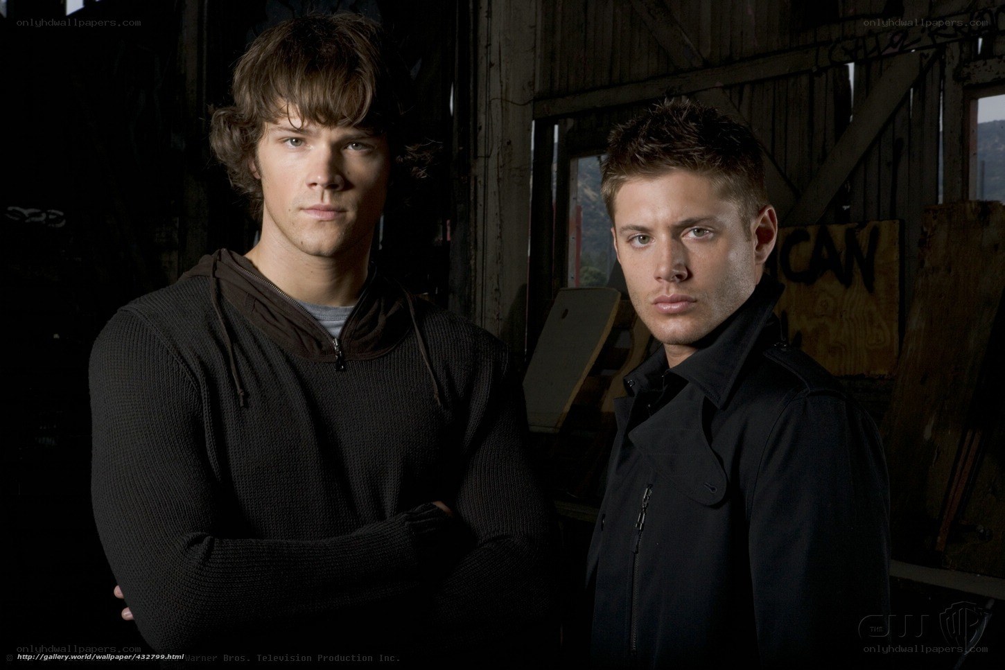 two men in a dimly lit room