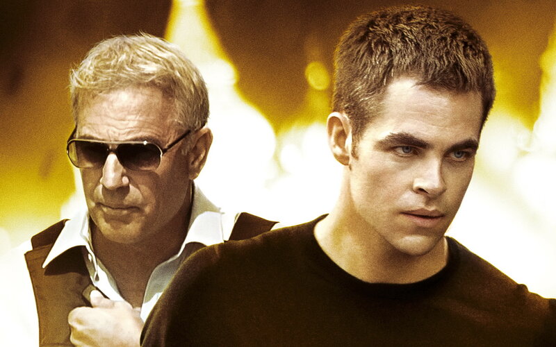 Two Men in a Dimly Lit Room — Yellow