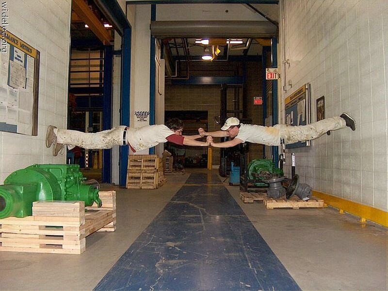 Two men in a factory
