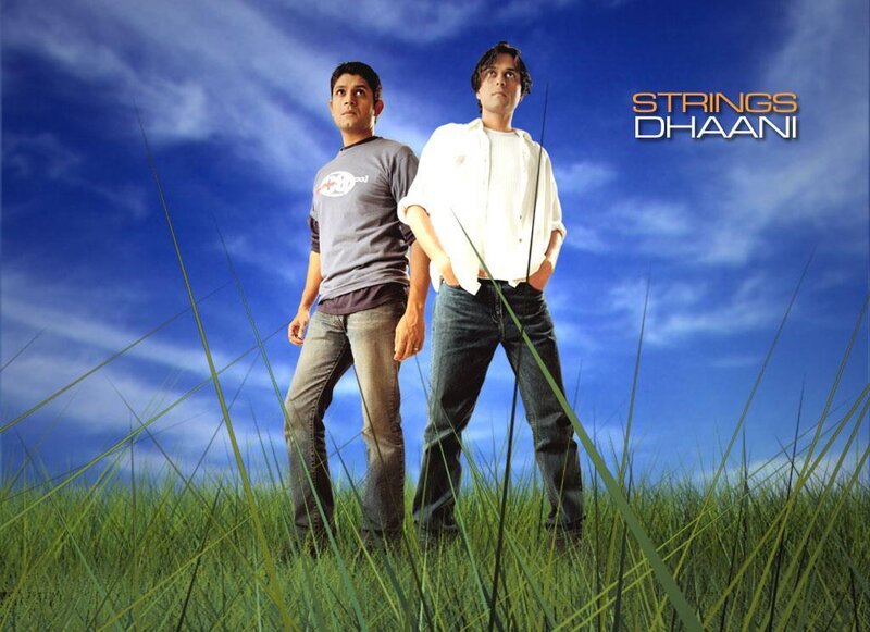 Two men in a field with text